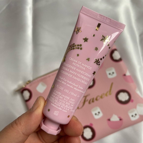 Too faced makeup pouch & Estée Lauder hand - Picture 7 of 9